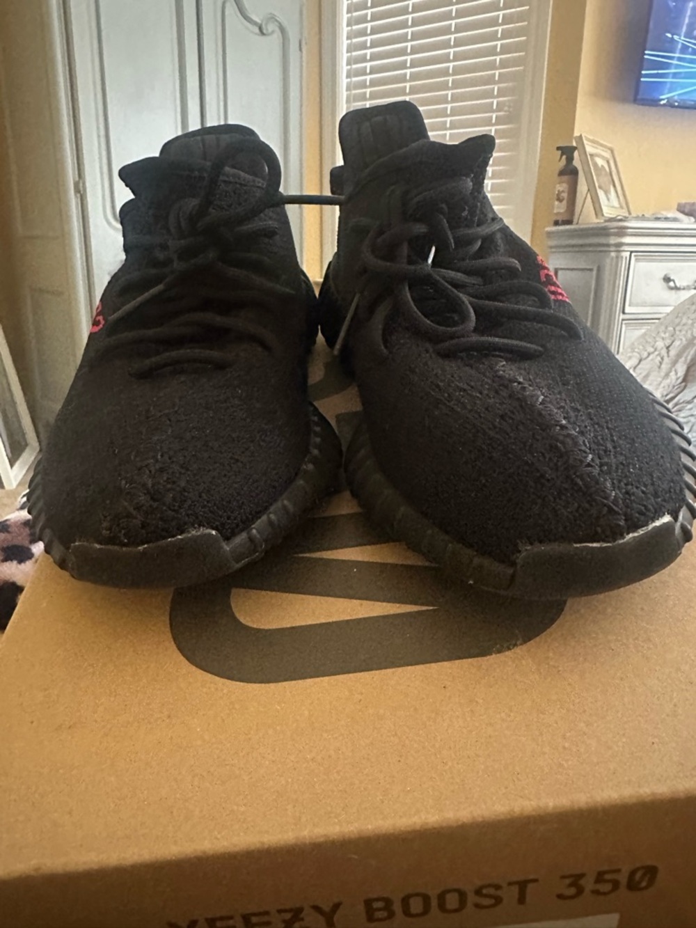 Yeezy Boost 350 V2 Black Sneakers with Red Heel Detail